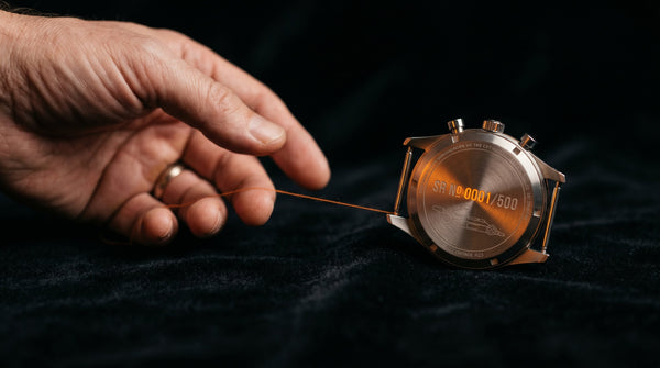 Cypher Watch Company founder giving away serial number 0001 of the Paddock 74 chronograph — the first watch ever made — to a customer named Euan from Bangalore