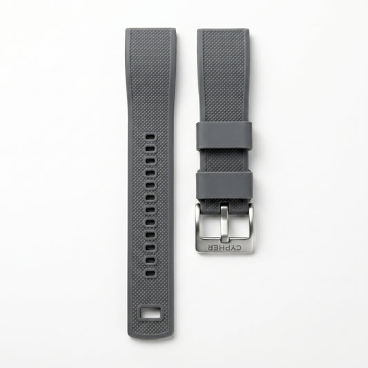Cypher dual-tone silicone strap in Stealth Black with cross-hatch texture and brushed steel CYPHER buckle — front view